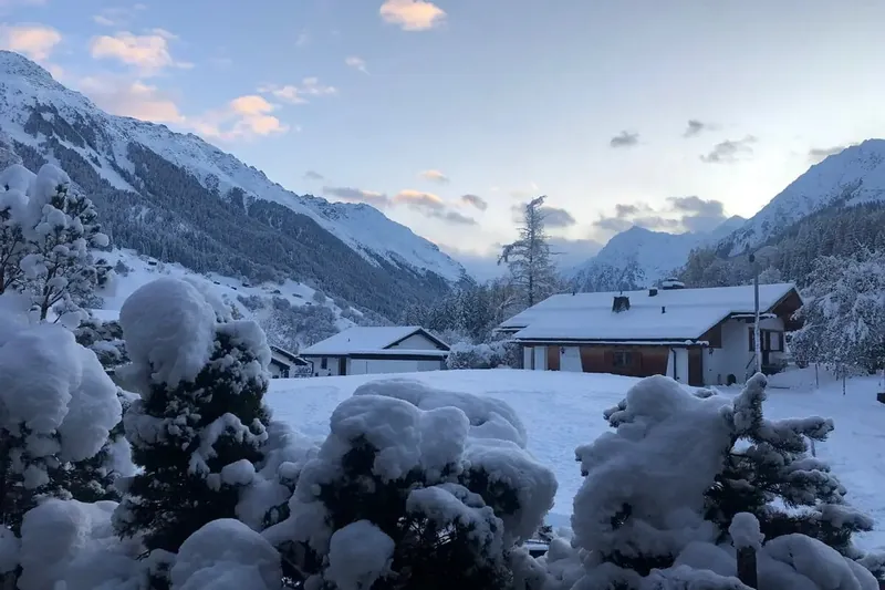 The view from Chalet Corey over snowy Klosters to the peaks