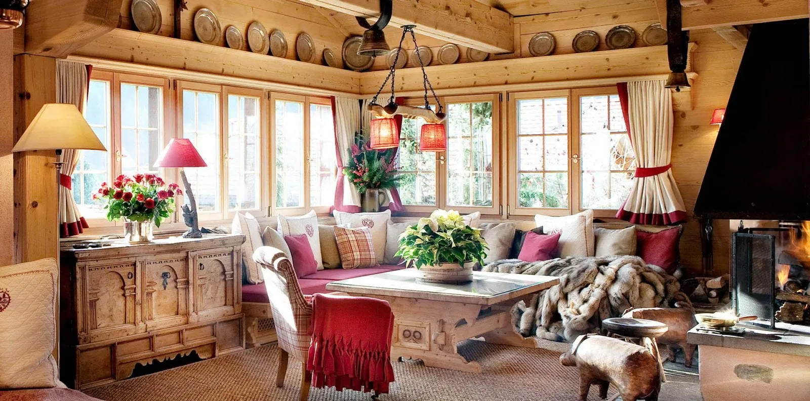 The pine-panelled drawing room of Chalet Valli, Klosters
